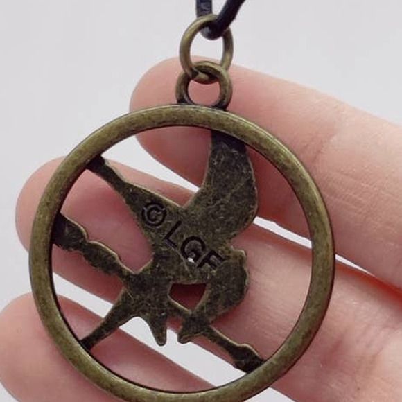 Lionsgate Lgf The Hunger Games Mockingjay Pendant Necklace On Black 9" Cord - Picture 5 of 7